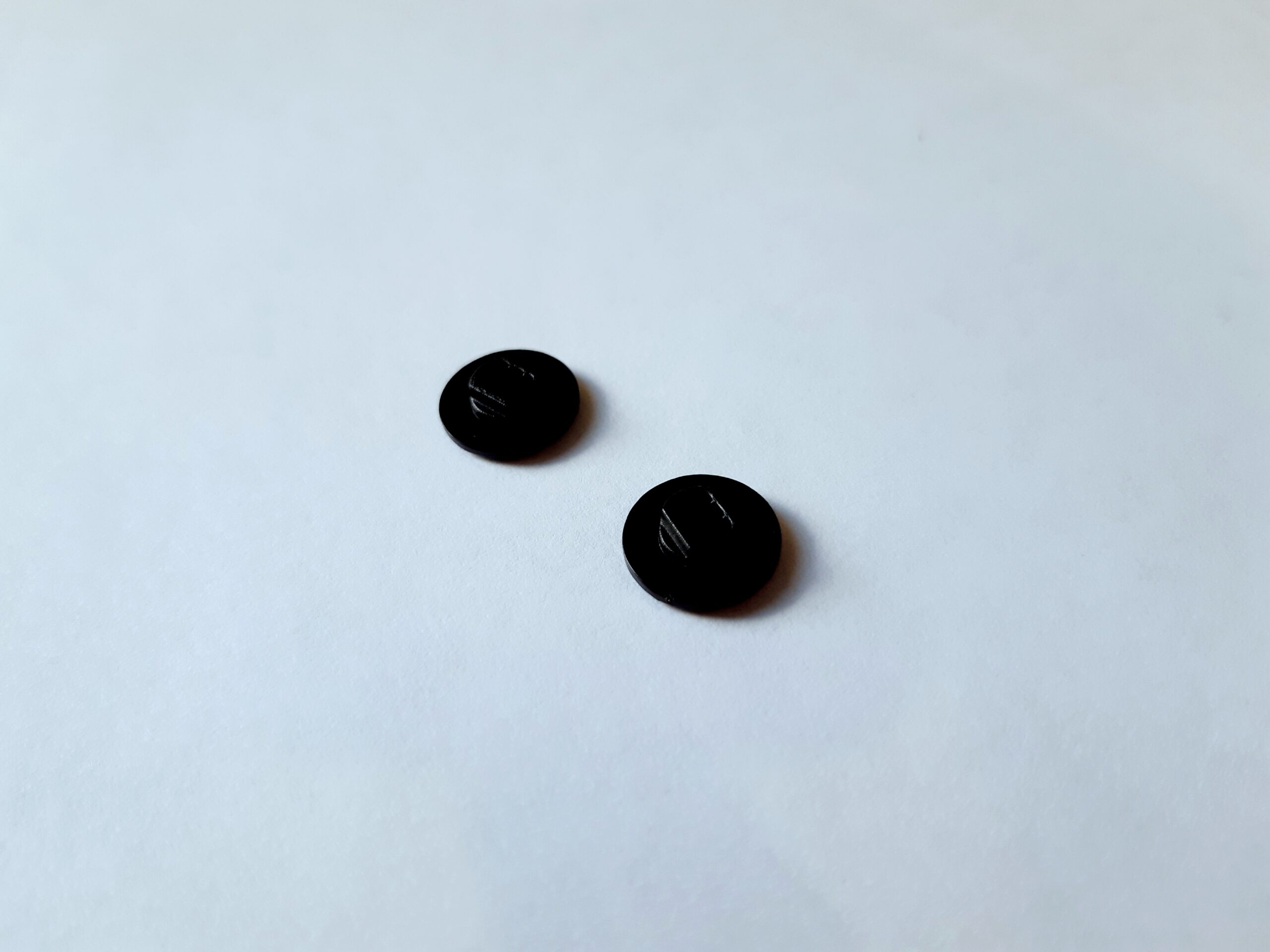 tappo-analogico-nero-psp-1000-ricambio Cappuccio singolo in plastica nera di ricambio per la levetta del joystick analogico della console portatile Sony PSP Fat serie 1000.